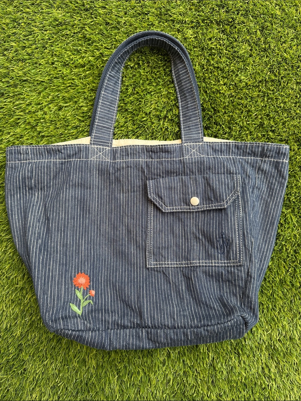 JW ANDERSON Blue Pinstripe Canvas Tote with Orange Floral Embroidery